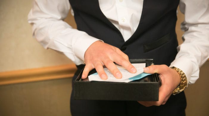 groom opening gift from bride Gift-Ideas-for-the-Groom